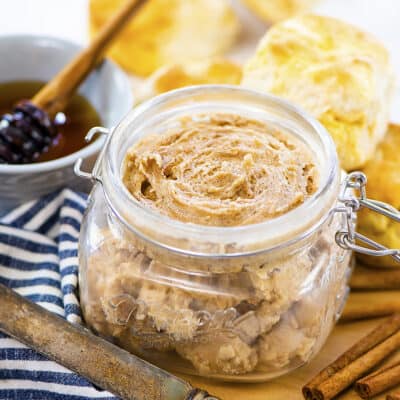 Honey butter in small glass jar.