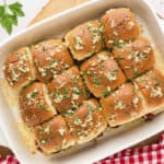 Hawaiian meatball sliders in baking dish.