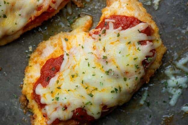 A close up of chicken parmesan