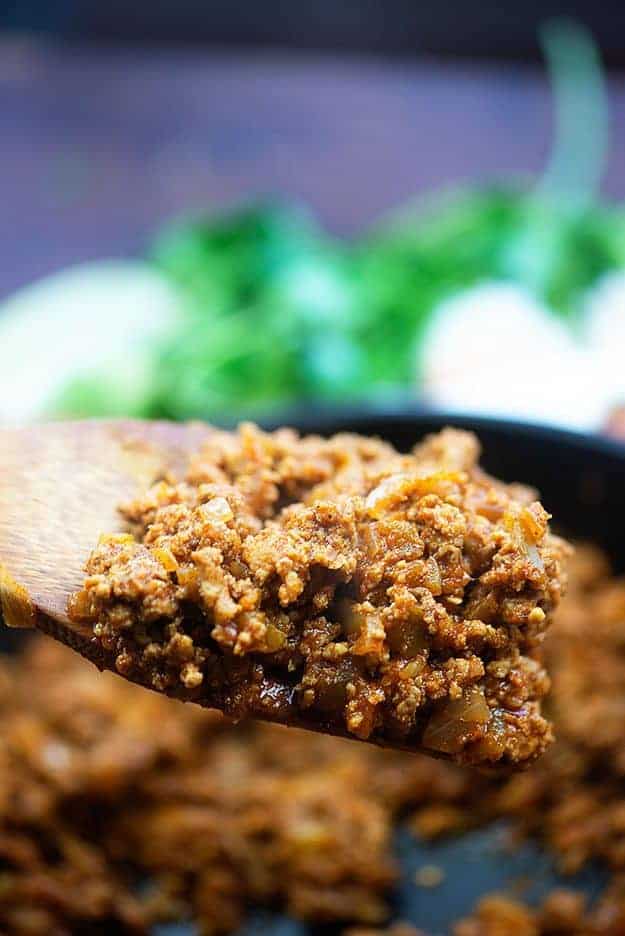 Taco meat on a wooden spoon