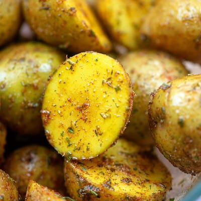 A closeup of seasoned potatoes