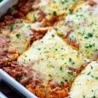 Skip the lasagna noodles - cheese ravioli is PERFECT for making lasagna! Extra cheesy and extra easy! #lasagna #easyrecipe #dinner