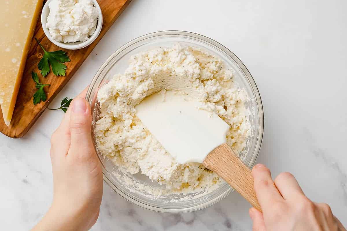 ricotta cheese in glass bowl.