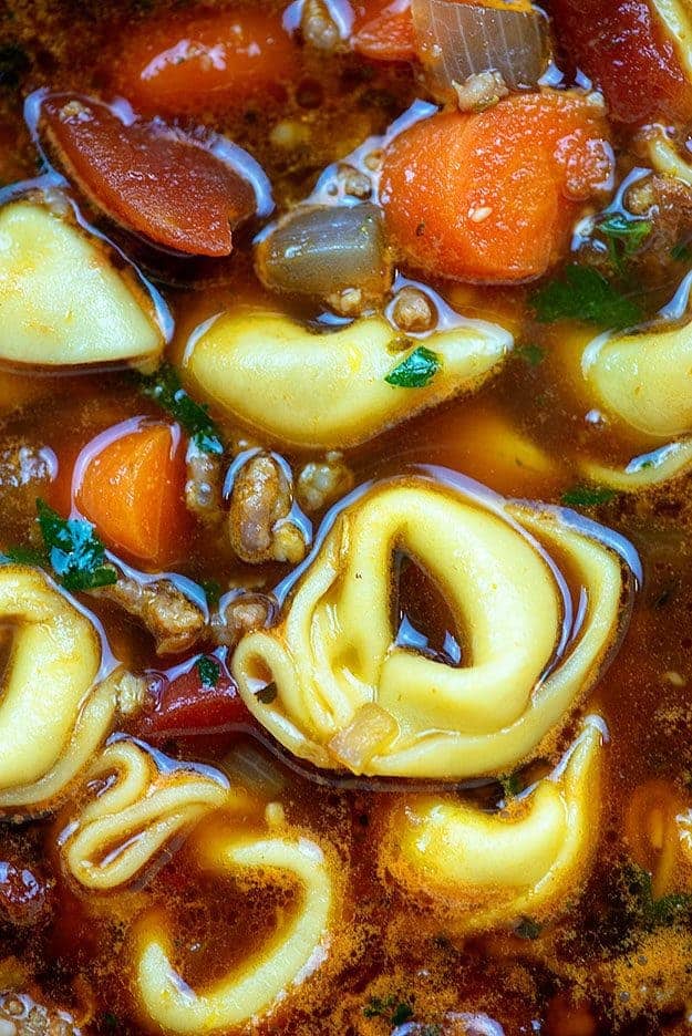 Easy tortellini soup made with sausage and loads of veggies!