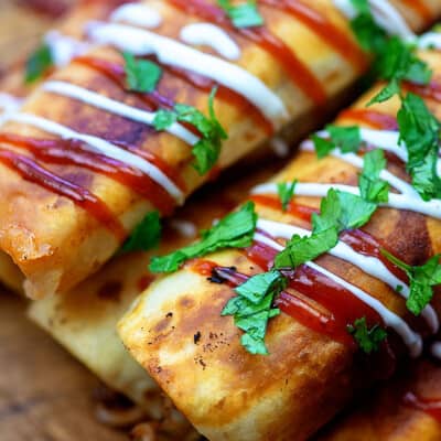 A bunch of taquitos stacked on top of each other.