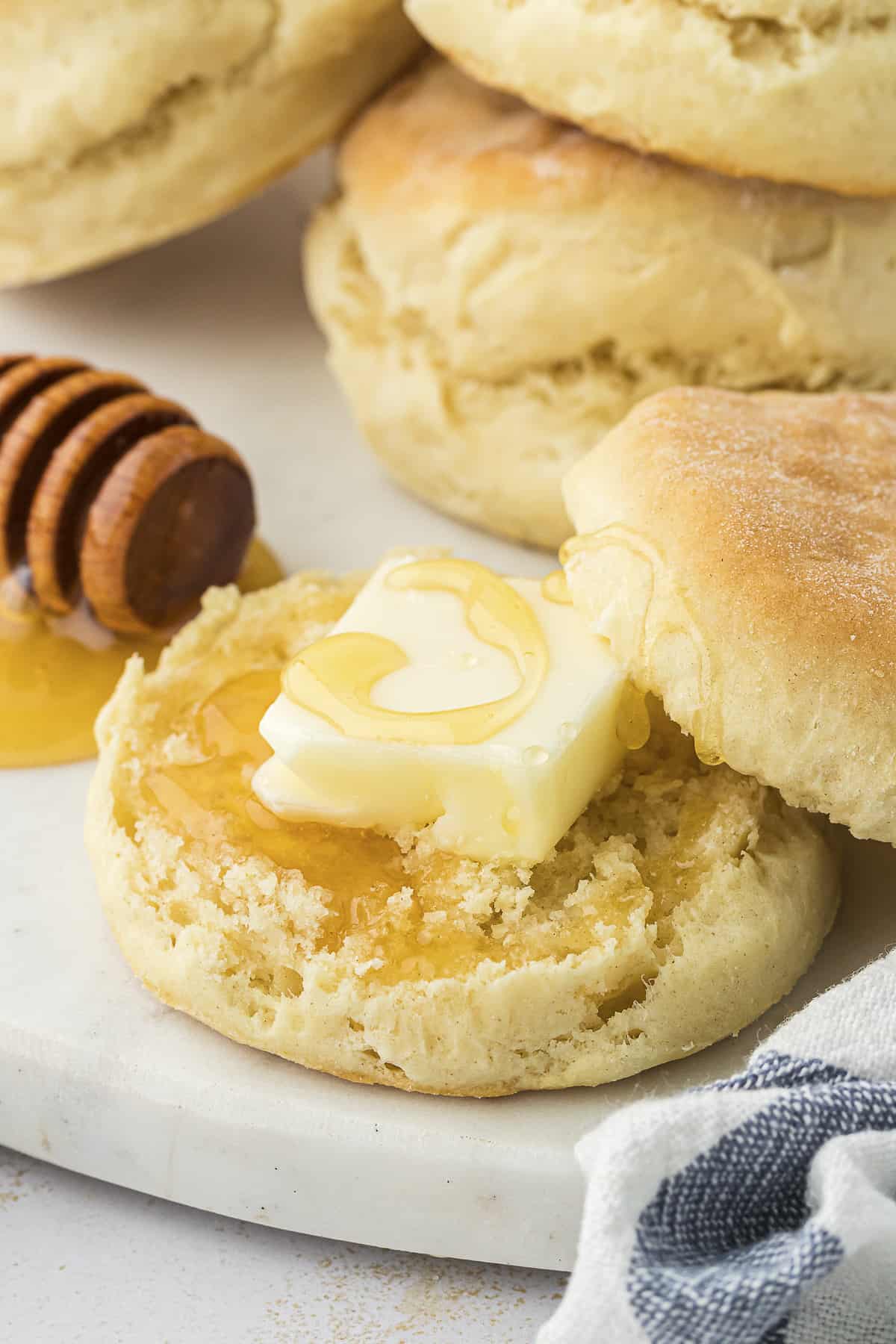 Bisquick biscuit topped with butter and honey.