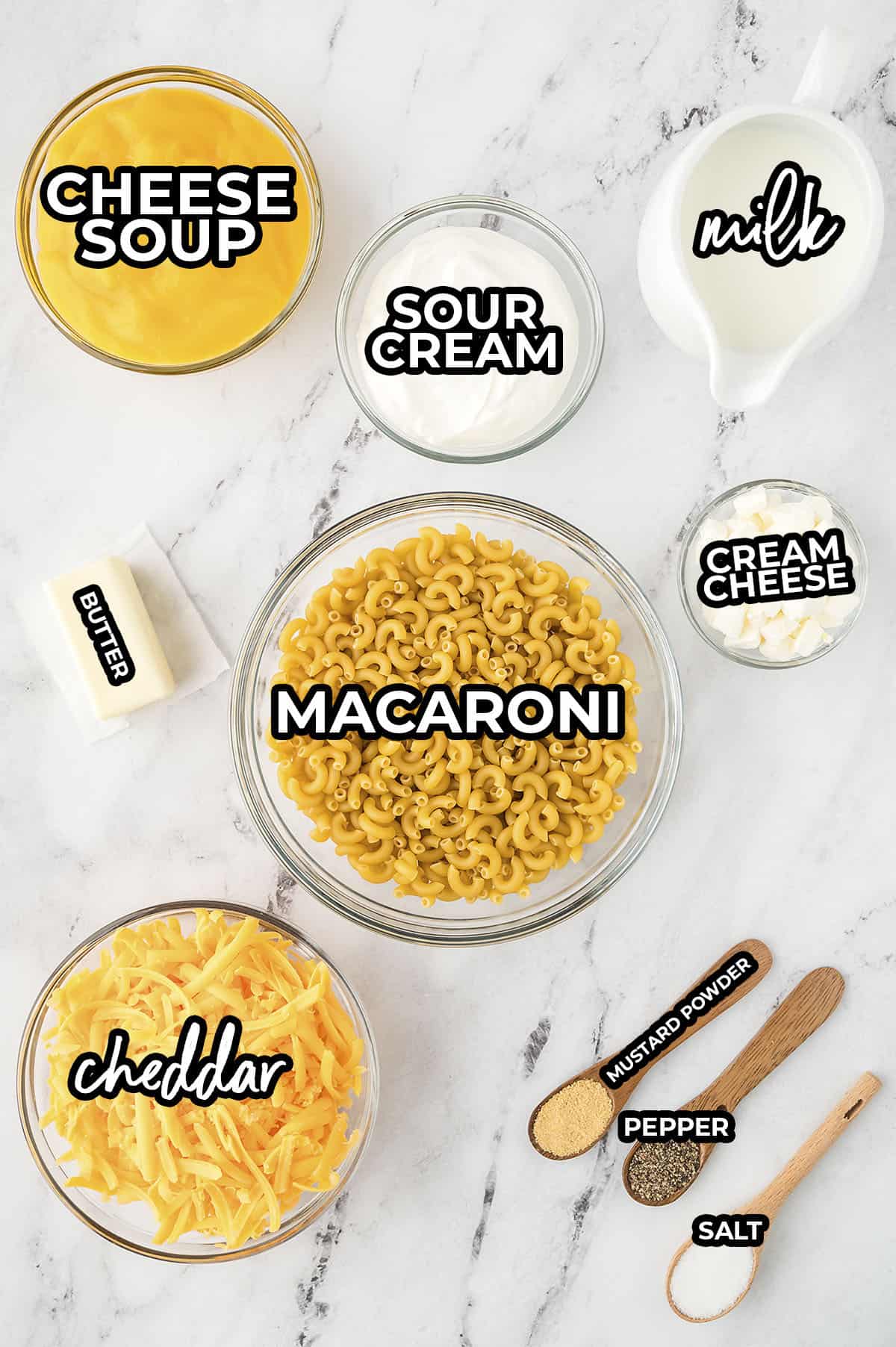 Ingredients for crockpot mac and cheese on counter.