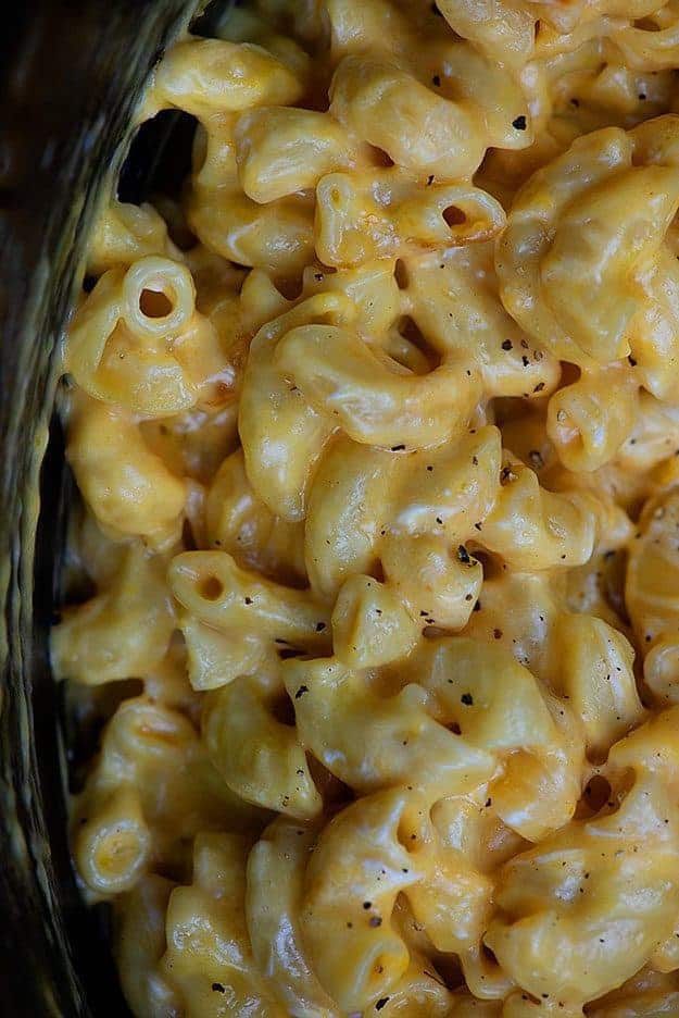 A close up of mac and cheese in a crockpot.
