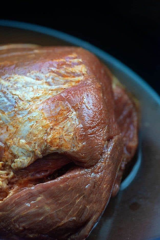 seasoned pork shoulder in slow cooker