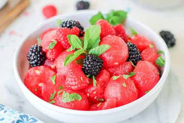 watermelon salad in white bowl