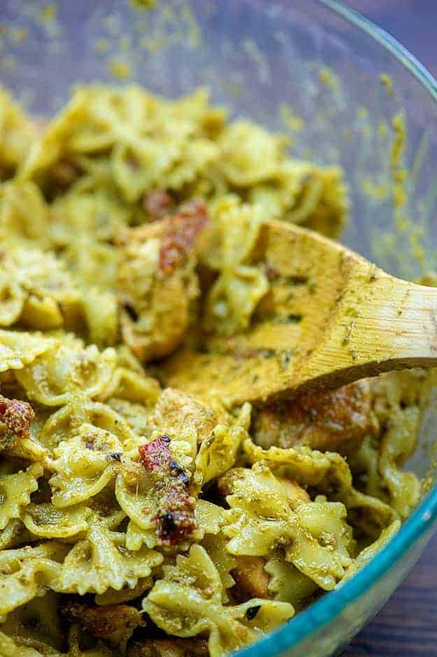 pesto with pasta in glass bowl