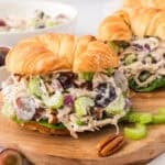 Chicken salad with grapes on croissant.