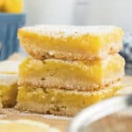 Lemon bars stacked together.