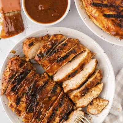 Barbecue grilled chicken on plate.