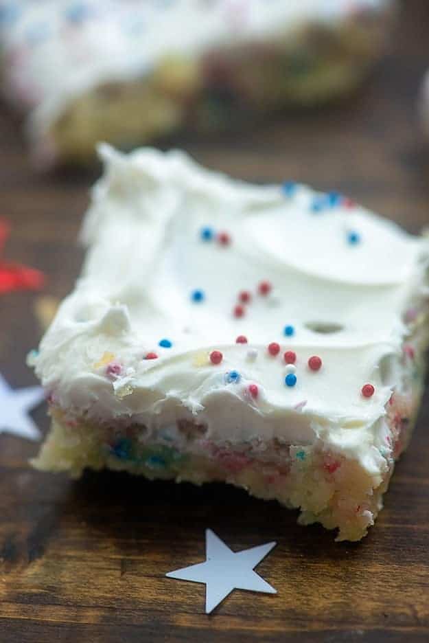 sugar cookie bars with white frosting.