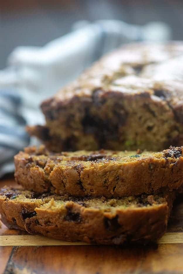 Close up of slices of zucchini bread cut off the loaf.