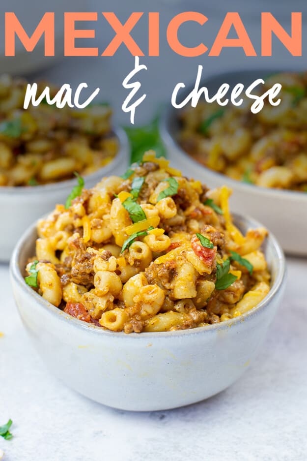 Mexican macaroni and cheese in bowl with text for Pinterest.