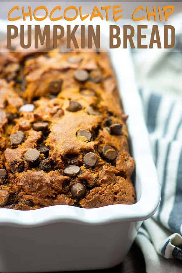 Close up of pumpkin bread in a white bread pan.