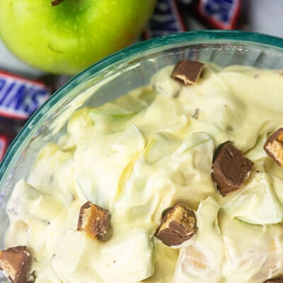 snicker apple salad in glass bowl