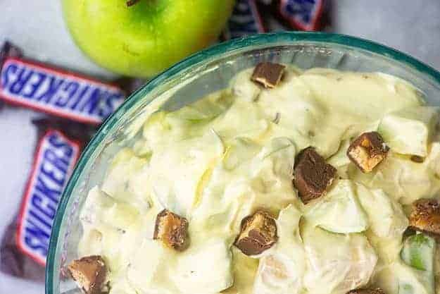 snicker apple salad in glass bowl