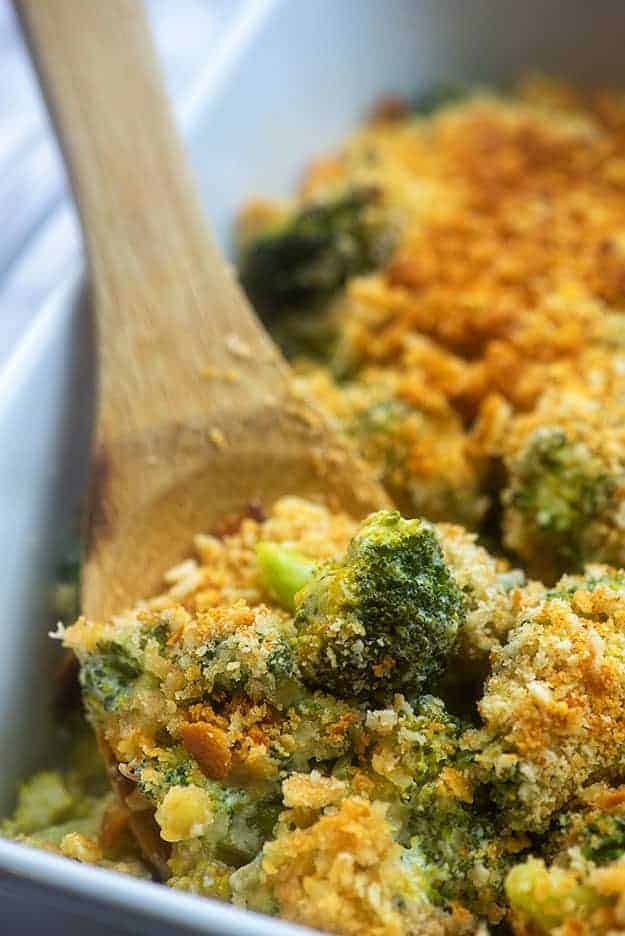 Broccoli on a wooden spoon.