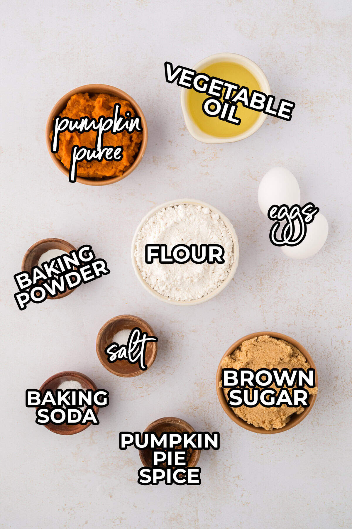 Ingredients for pumpkin cupcakes on counter.