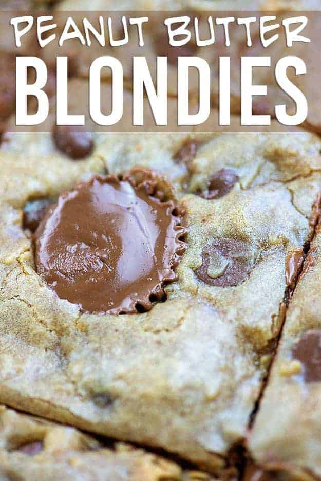 A close up of blondies, chocolate chips, and mini peanut butter cups.