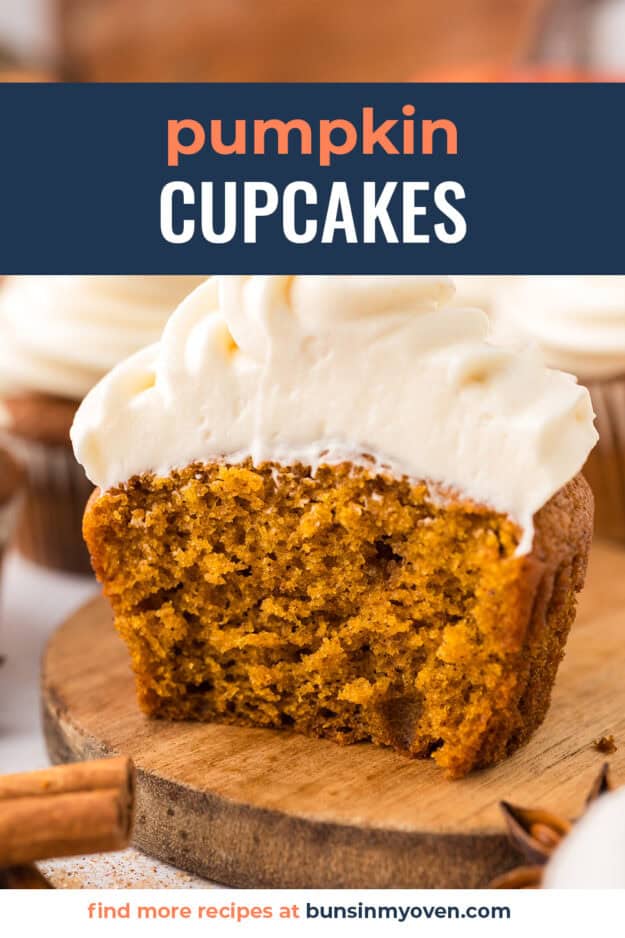Pumpkin cupcakes cut in half topped with frosting.