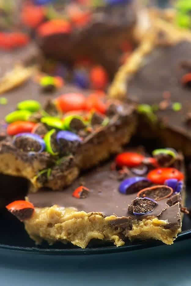 Crushed M&M\'s on top of chocolate peanut butter bars.