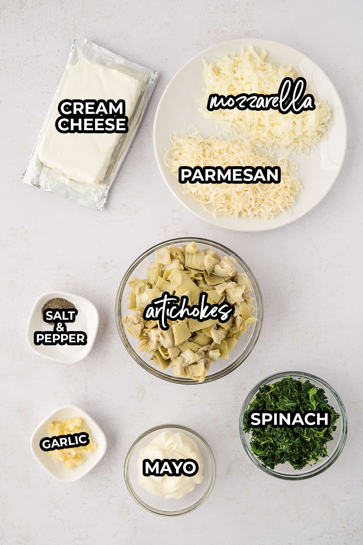 Ingredients for spinach artichoke dip recipe.