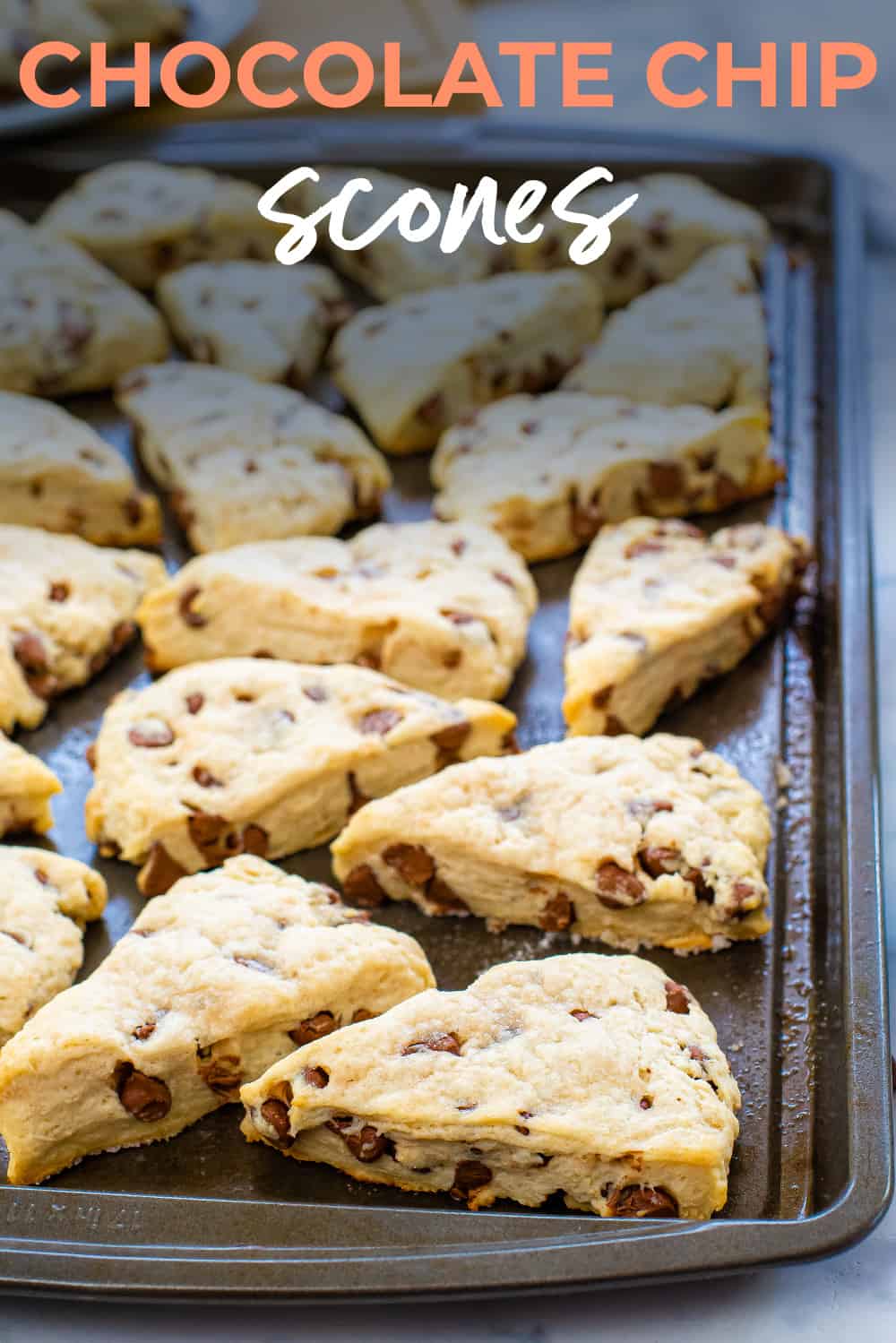 Baked scones on cookie sheet.