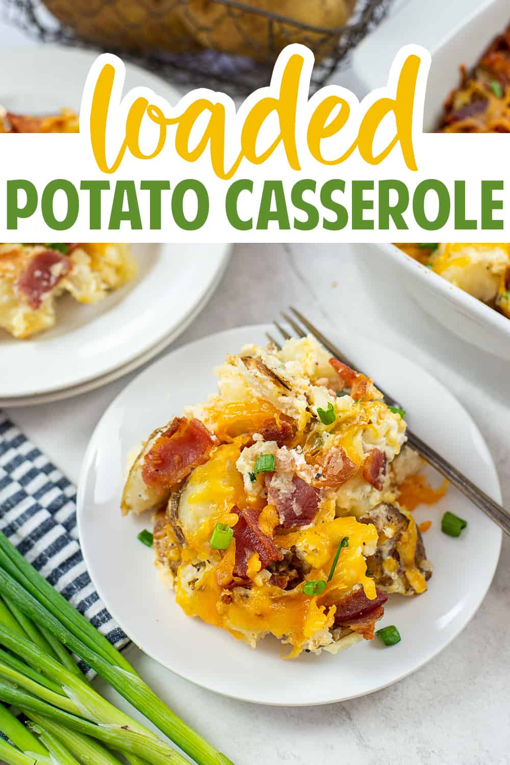 loaded potato casserole on white plate with text for Pinterest.