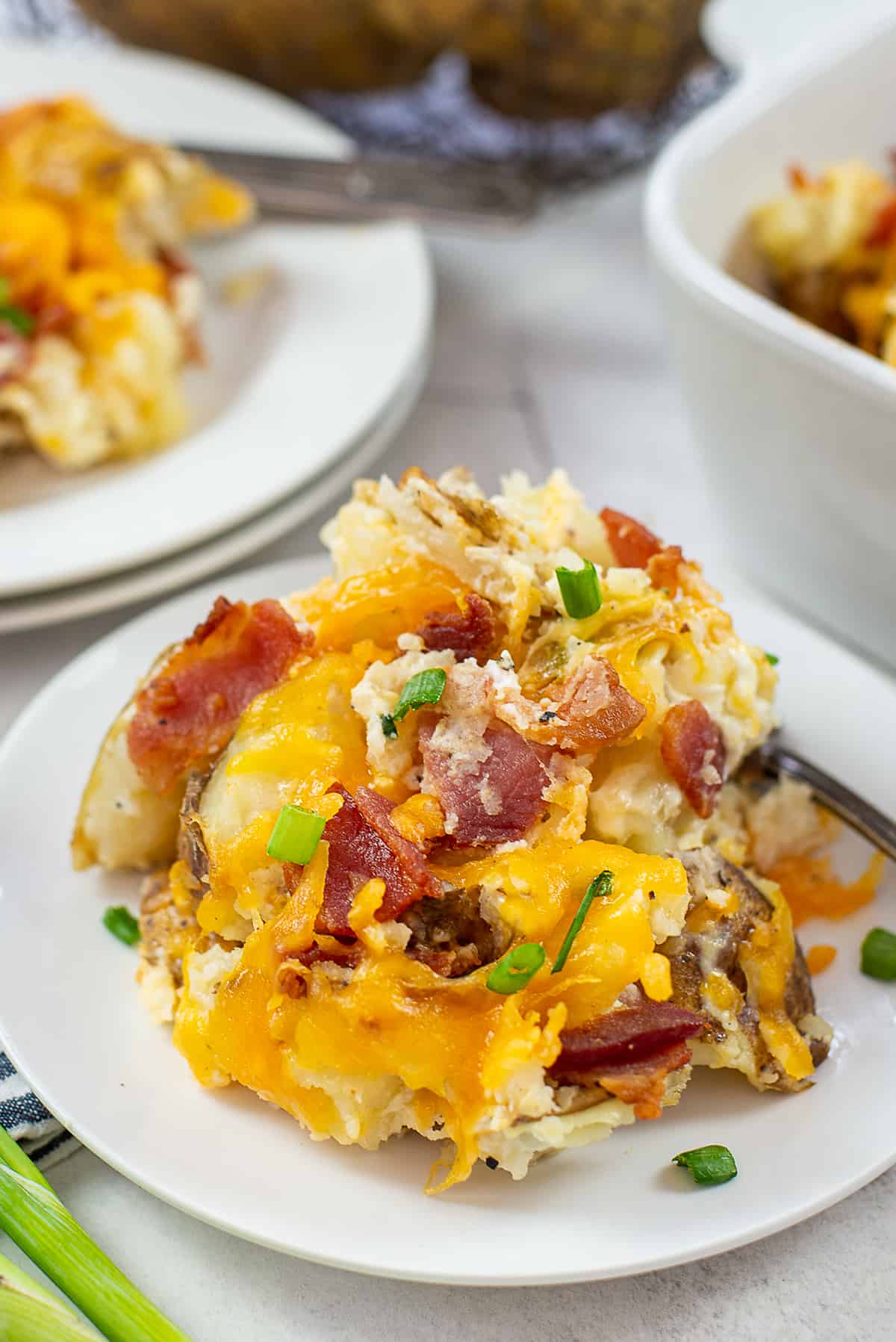 baked potato casserole on white plate.