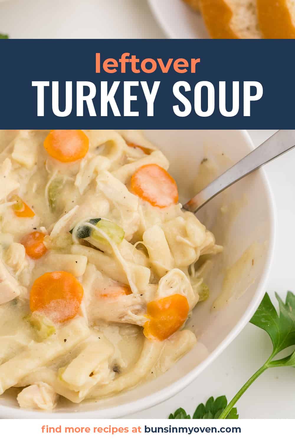 Leftover turkey soup in white bowl.
