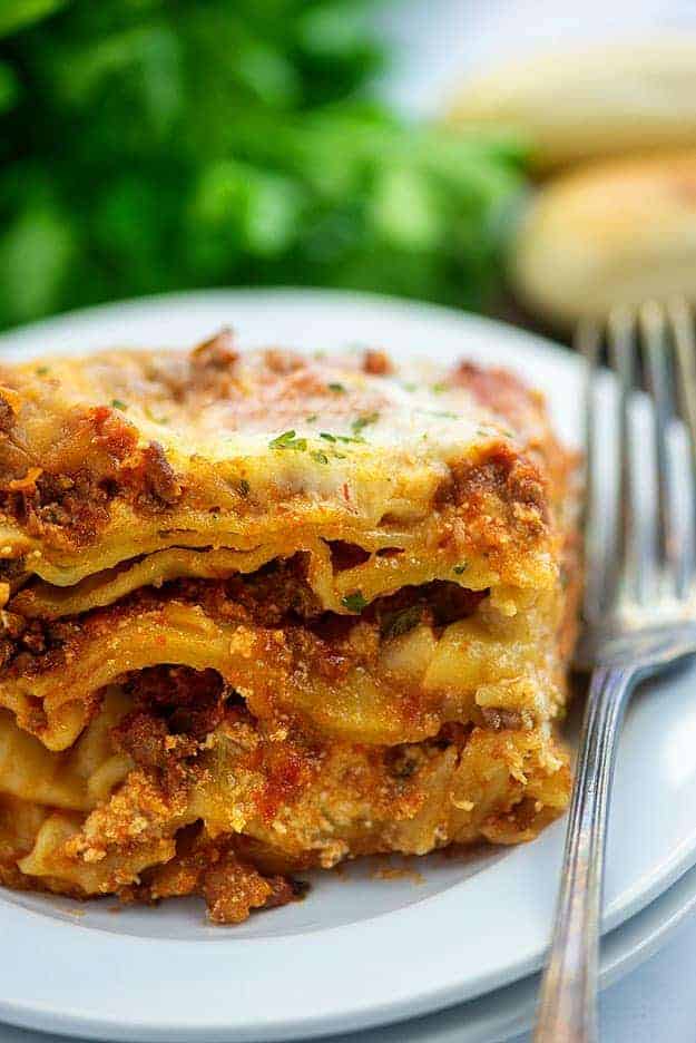 slow cooker lasagna on white plate