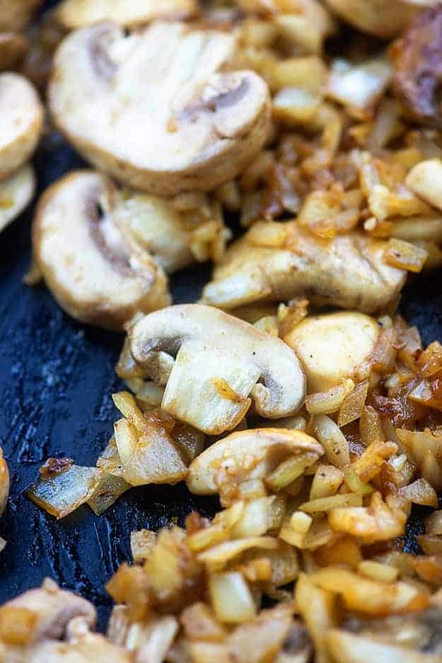 mushrooms and onions in skillet