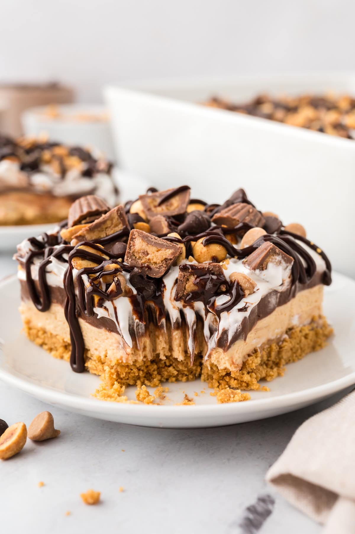 Peanut butter lasagna on white plate.