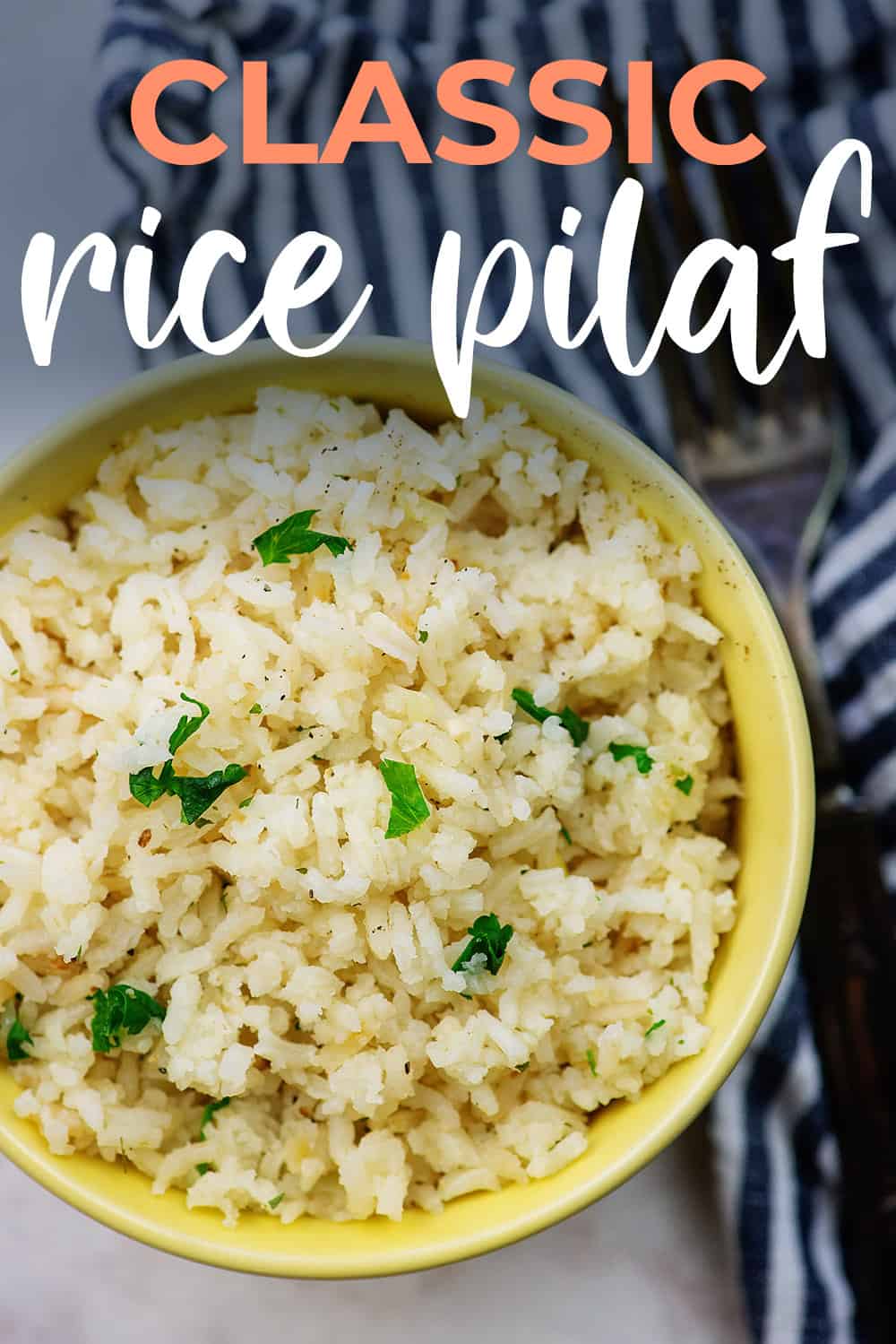 classic rice pilaf in yellow bowl.