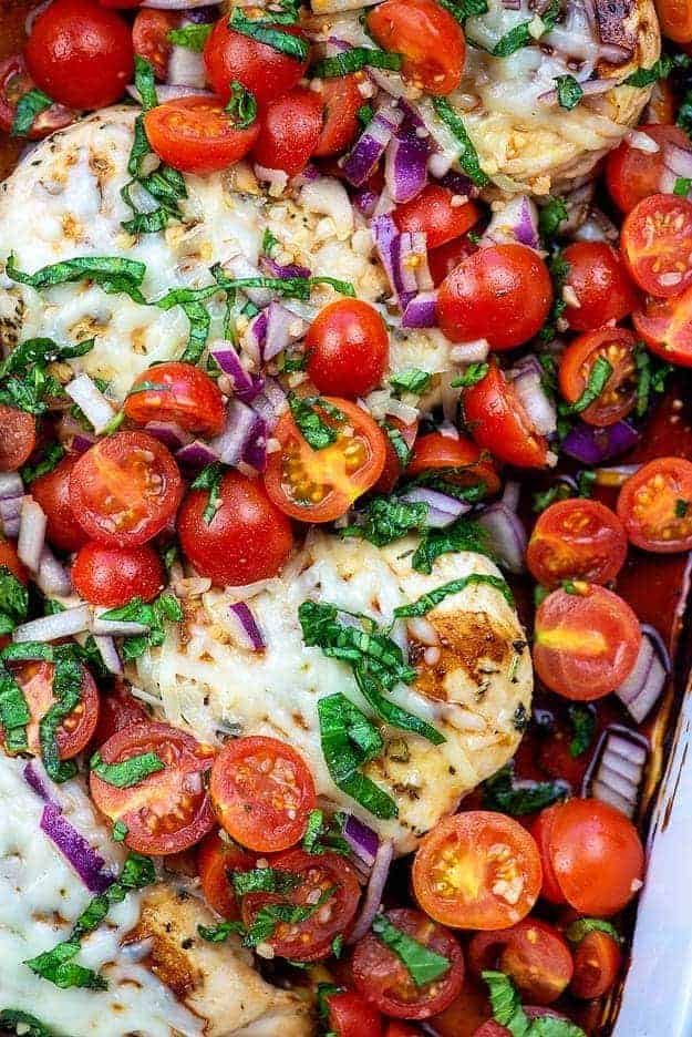 baked bruschetta chicken in white dish