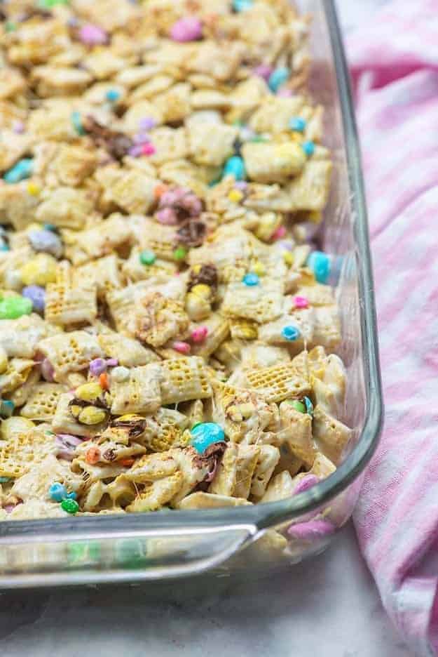 marshmallow cereal bars in glass baking dish with sprinkles