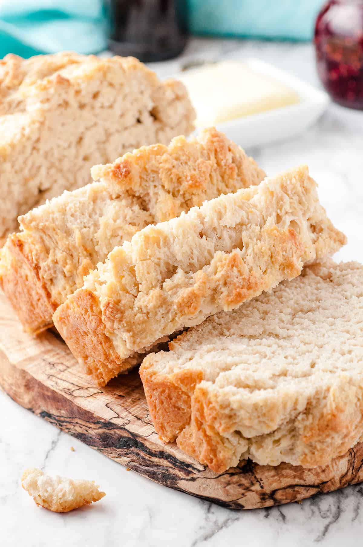 thick sliced beer bread on wooden board