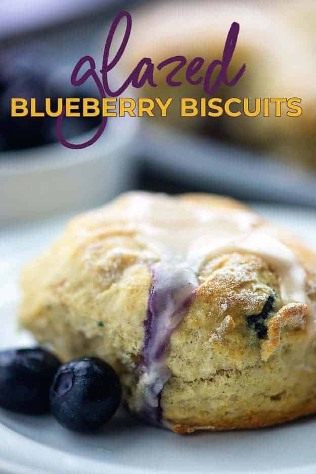 glazed blueberry biscuits on baking sheet