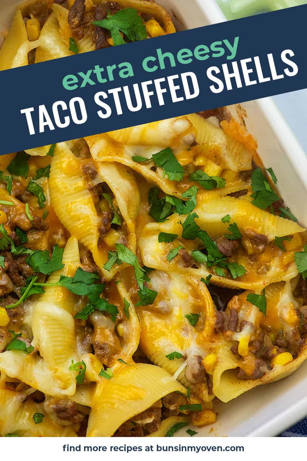 cheesy stuffed taco shells in baking dish.