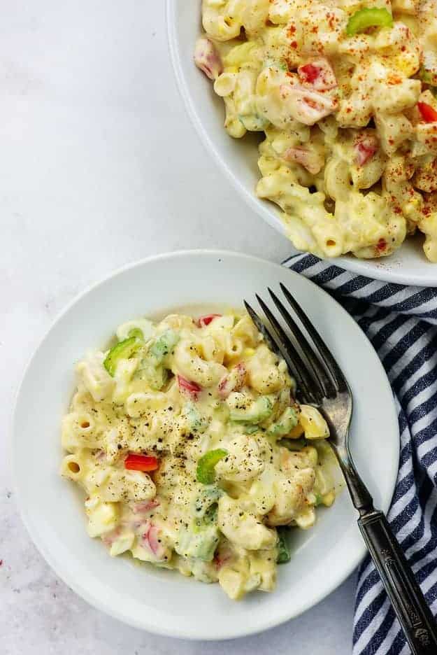 creamy macaroni salad on white plate