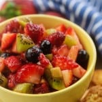 fruit salsa in yellow bowl with cinnamon sugar chips