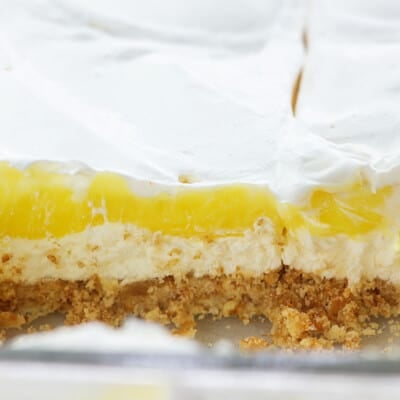 lemon lush dessert in glass pan