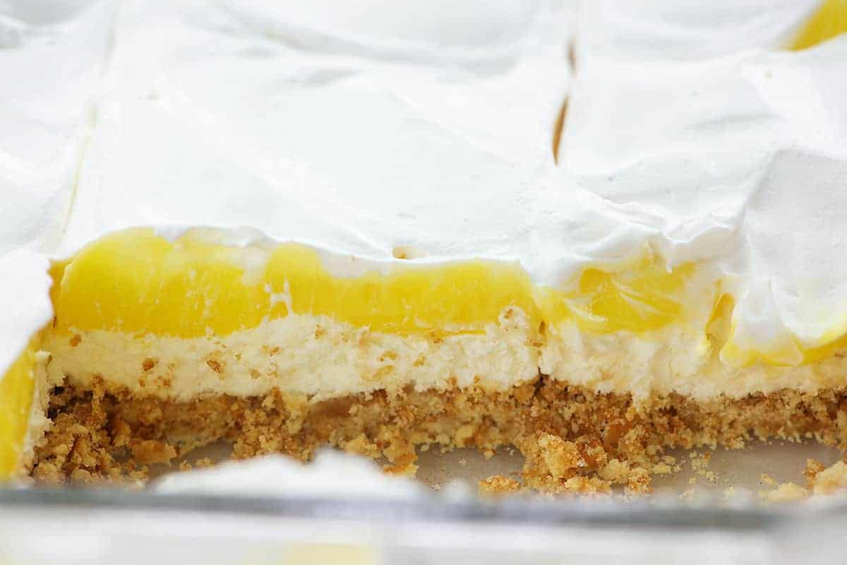 lemon lush dessert in glass pan