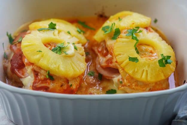 pizza stuffed chicken with pineapple in baking dish