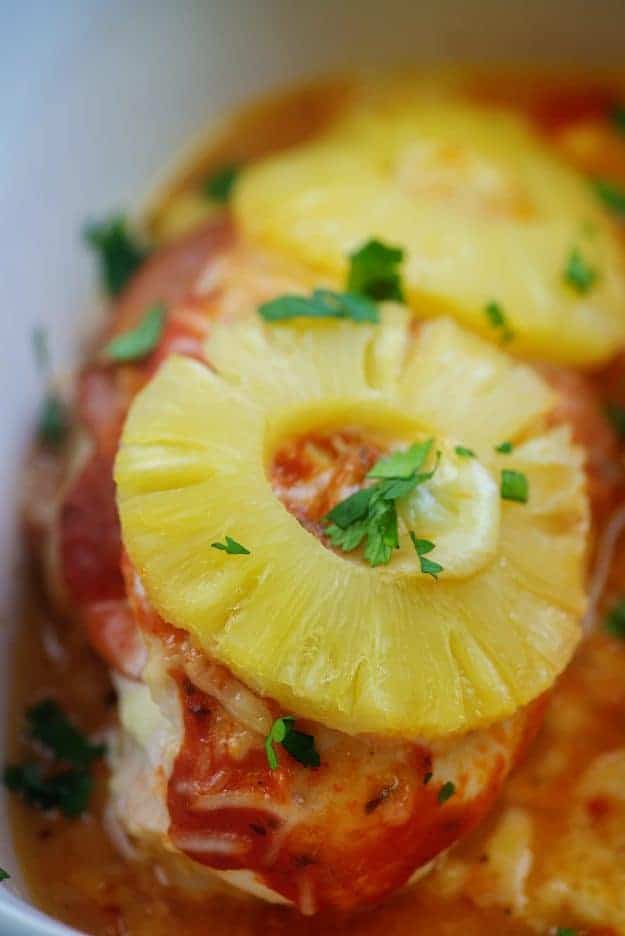 baked hawaiian pizza chicken in white baking dish