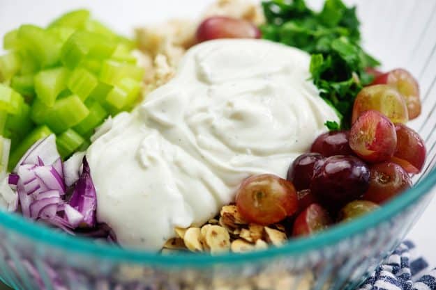 chicken salad recipe with greek yogurt dressing in glass bowl